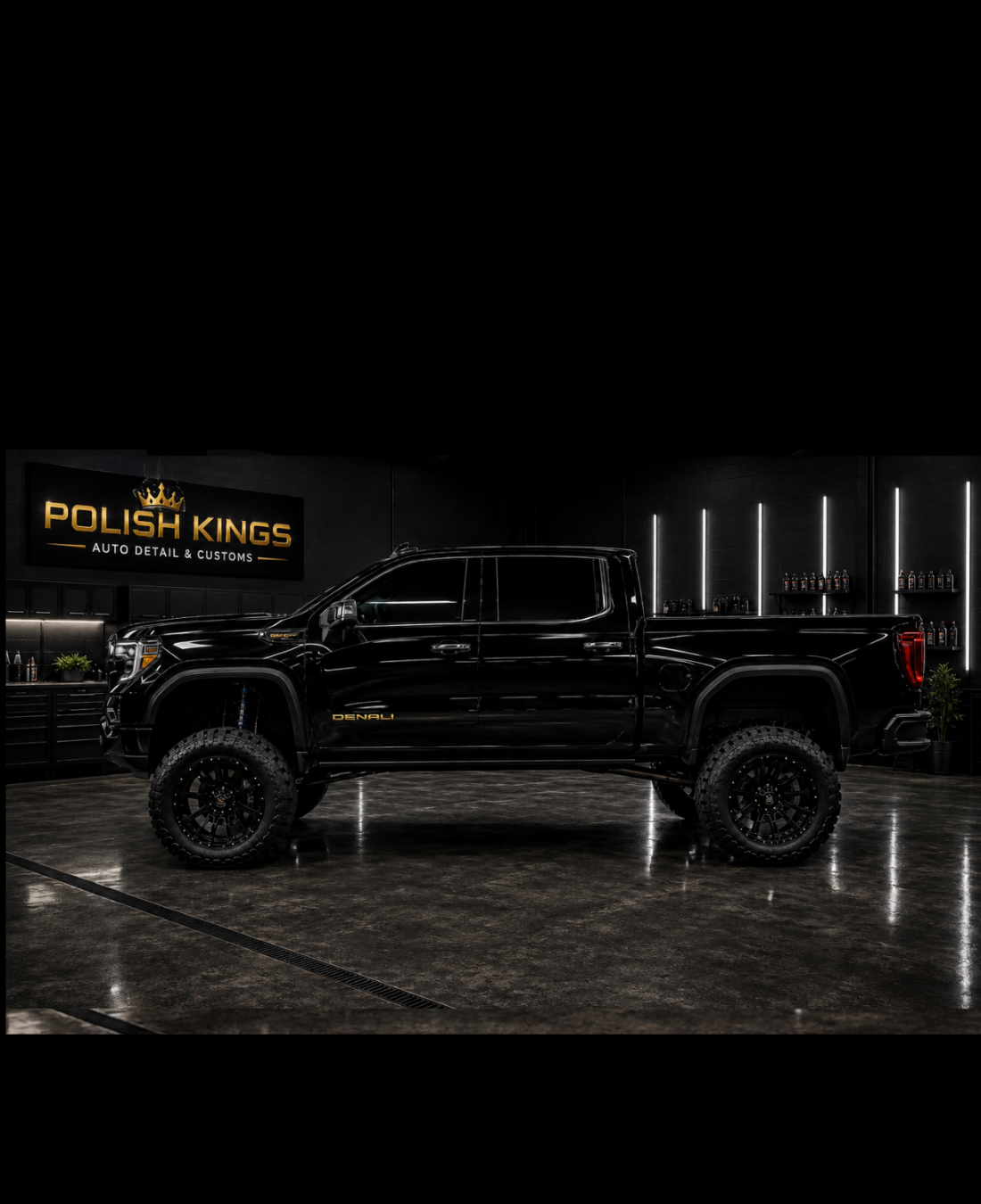 HERO IMAGE HOME PAGE OF GMC DENALI TRUCK IN SHOP SETTINGS WITH POLISH KINGS IN THE BACKGROUND 